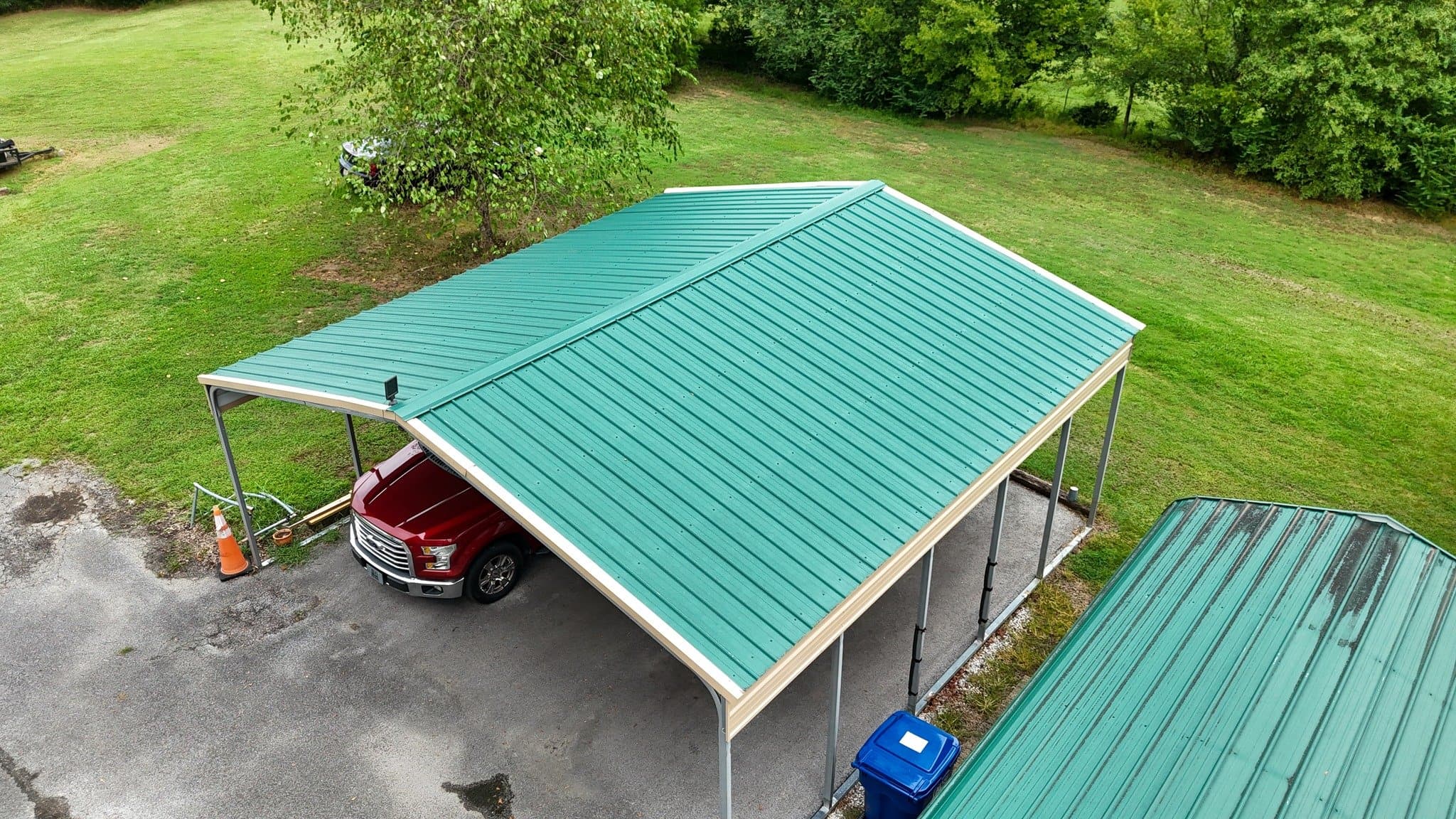 Green metal carport